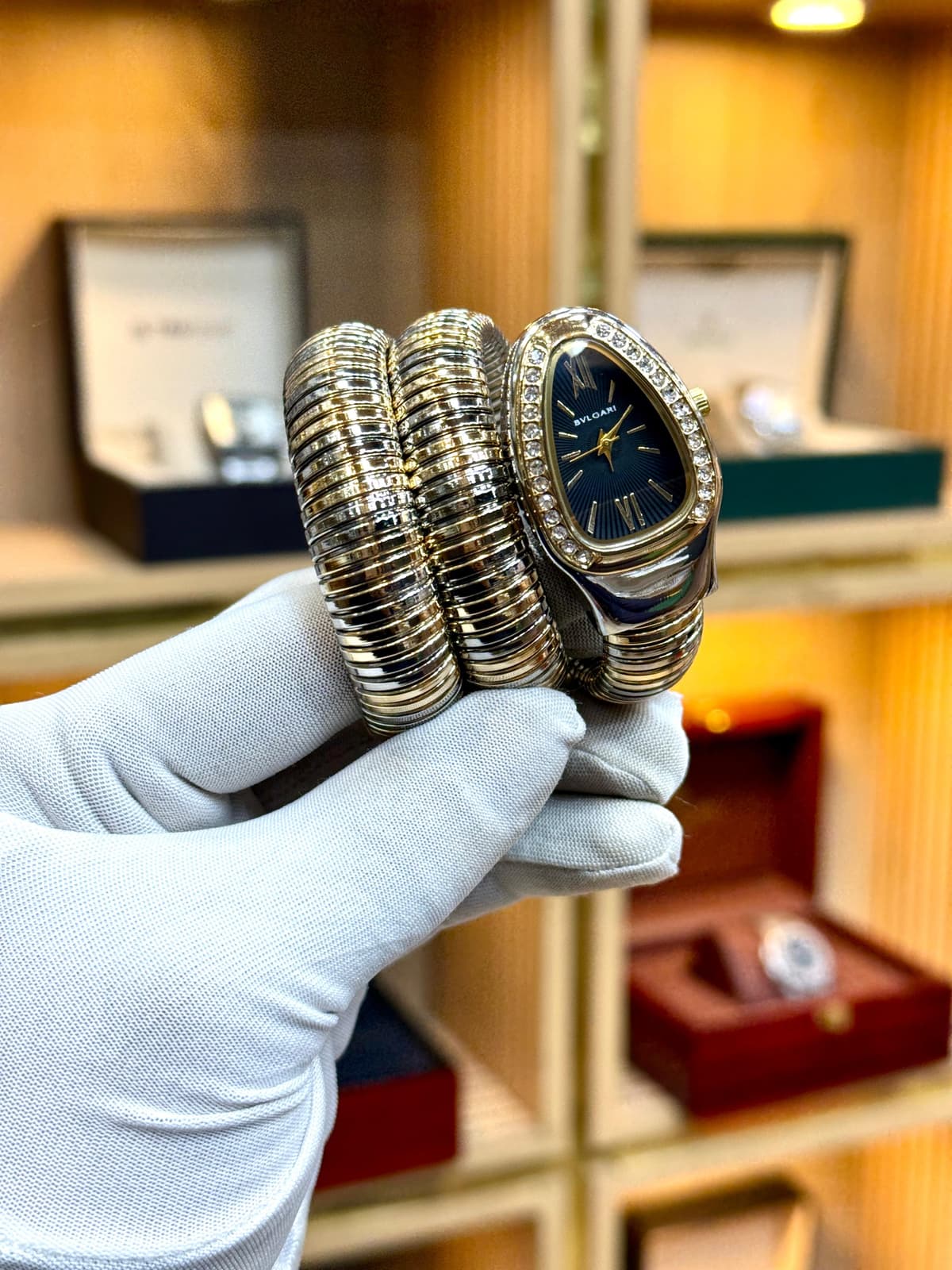 Golden black snake watch 